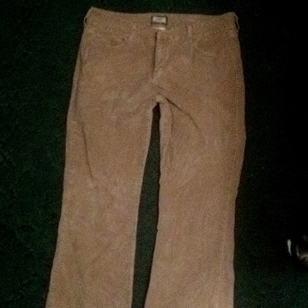 Levi's slender boot cut jeans,tan in color, size 14 medium